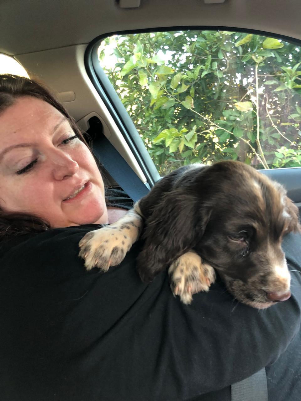 Genevieve with a puppy